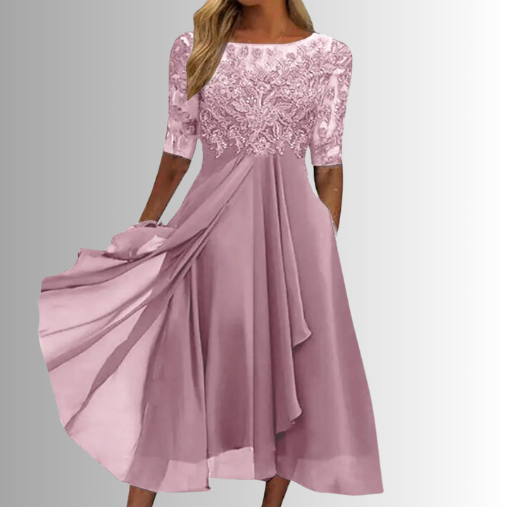 Stylish women's A-line midi dress featuring a delicate lace top & half sleeves. Ideal for spring/summer events.