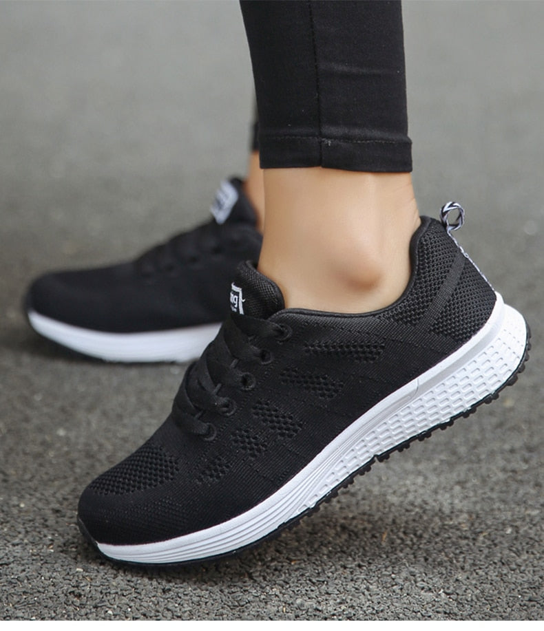 Stylish women's athletic running shoes, offering orthopedic support for pain-free movement.