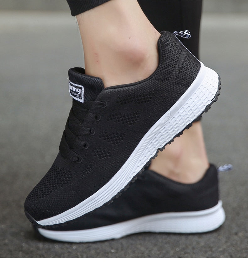 Comfortable women's orthopedic walking shoes with strong arch support for active pain relief.