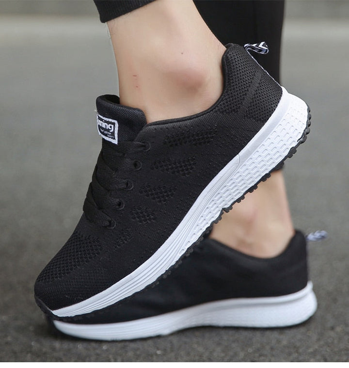 Comfortable women's orthopedic walking shoes with strong arch support for active pain relief.