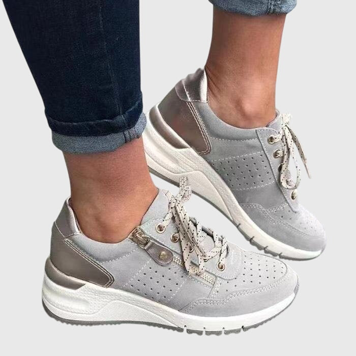 Supportive women's orthopedic sneakers, offering comfort, pain relief & foot health for active walking.