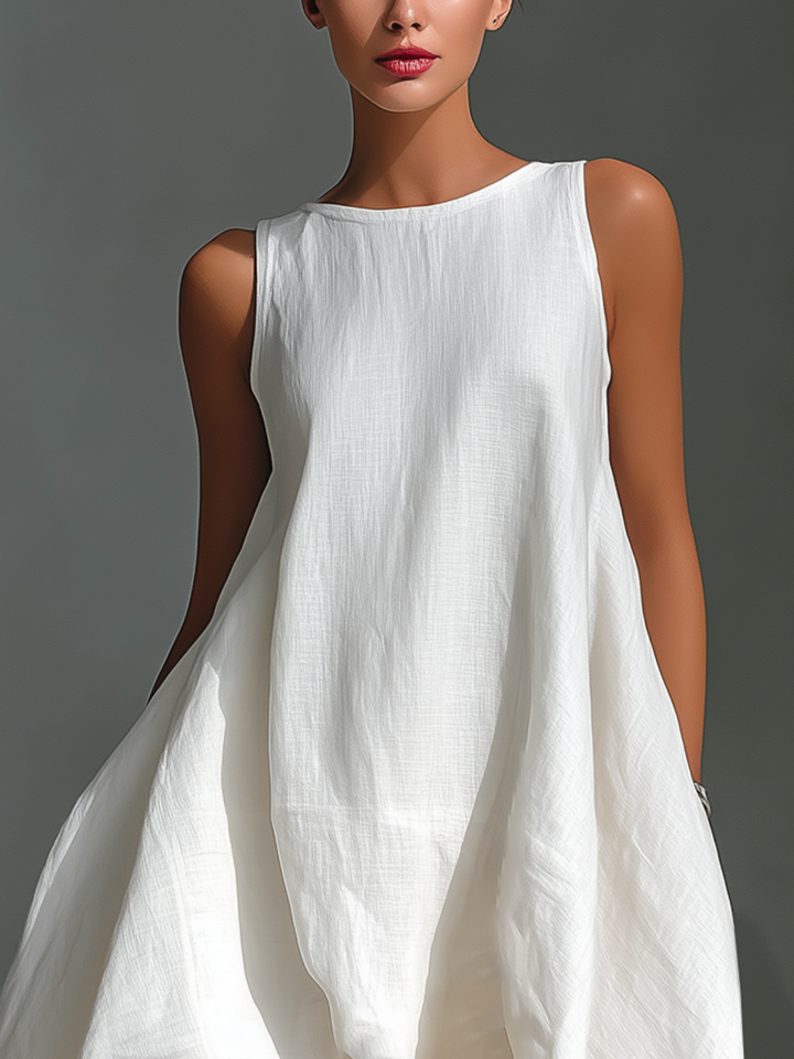 Women's chic sleeveless midi dress with a unique asymmetric hem. Perfect for summer fashion.