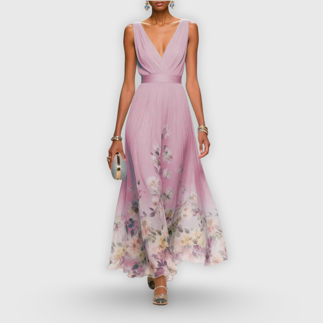 Comfortable pink floral sleeveless midi dress for women. Versatile casual summer day dress with elegant design.