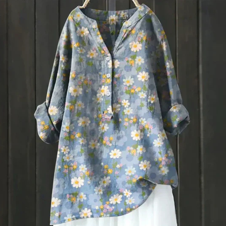 Stylish women's printed floral long sleeve blouse with a flattering V-neck, suitable for spring fashion.