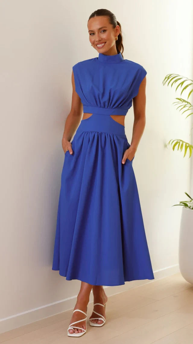 Women's elegant midi dress with beautiful pleats, a flowy design, and a sophisticated finish.