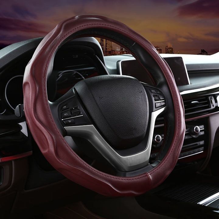 Premium PU leather steering wheel cover provides a secure non-slip grip & comfort for enhanced auto interior.