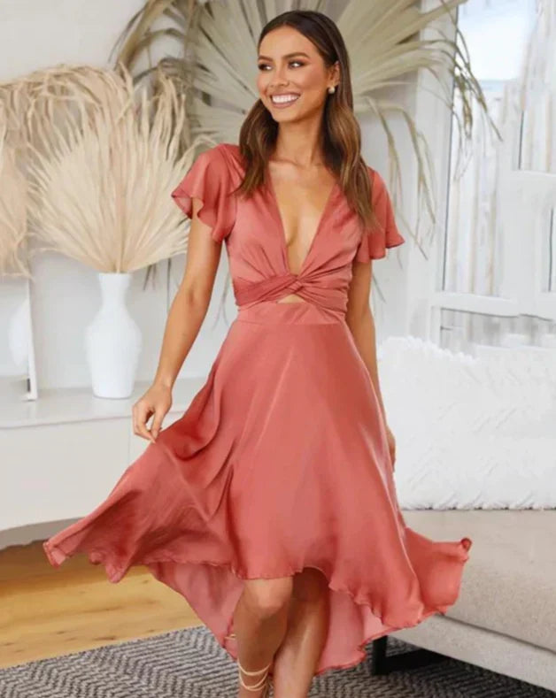 Flowy elegant women's midi dress with a flattering tie-waist and V-neck. Perfect for summer, parties, or evening events.