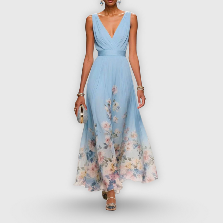 Elegant light blue women's floral sleeveless midi dress, perfect for summer casual or day events. Effortless style.