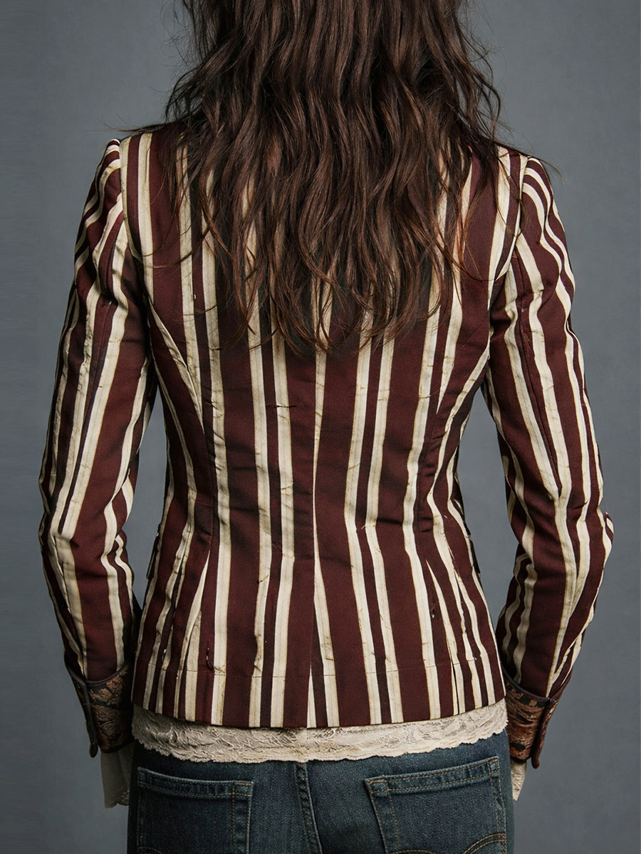 Fashionable women's tailored striped blazer, offering a chic retro bohemian look.