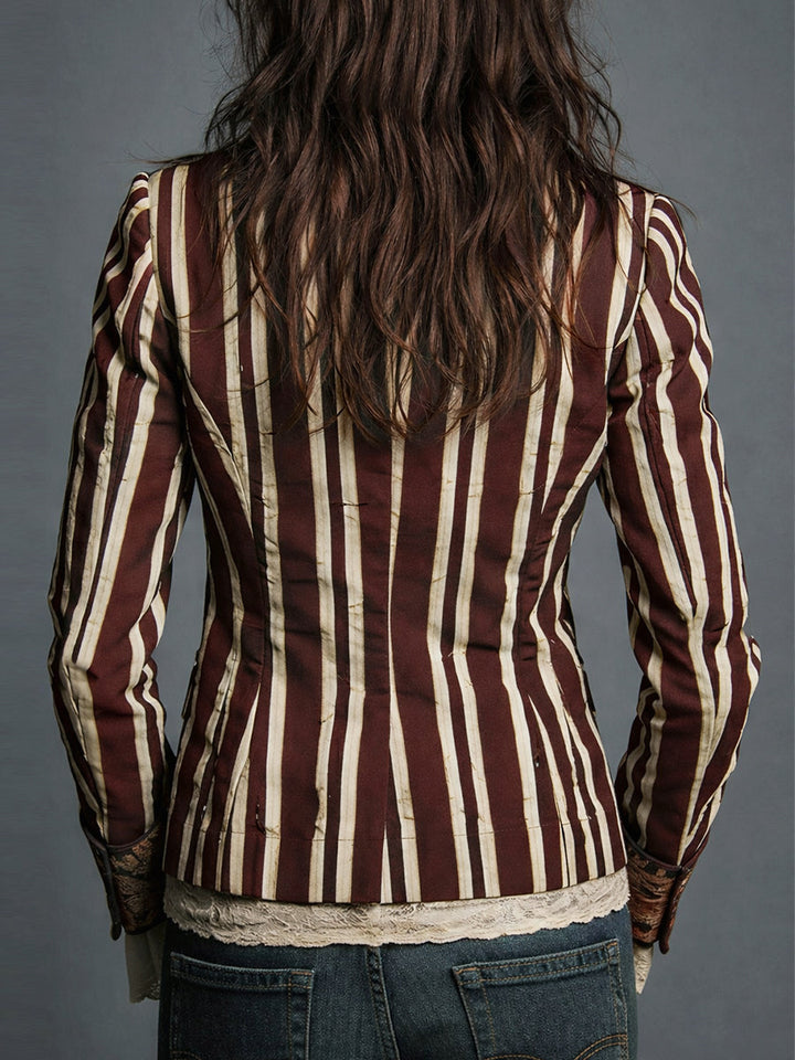 Fashionable women's tailored striped blazer, offering a chic retro bohemian look.