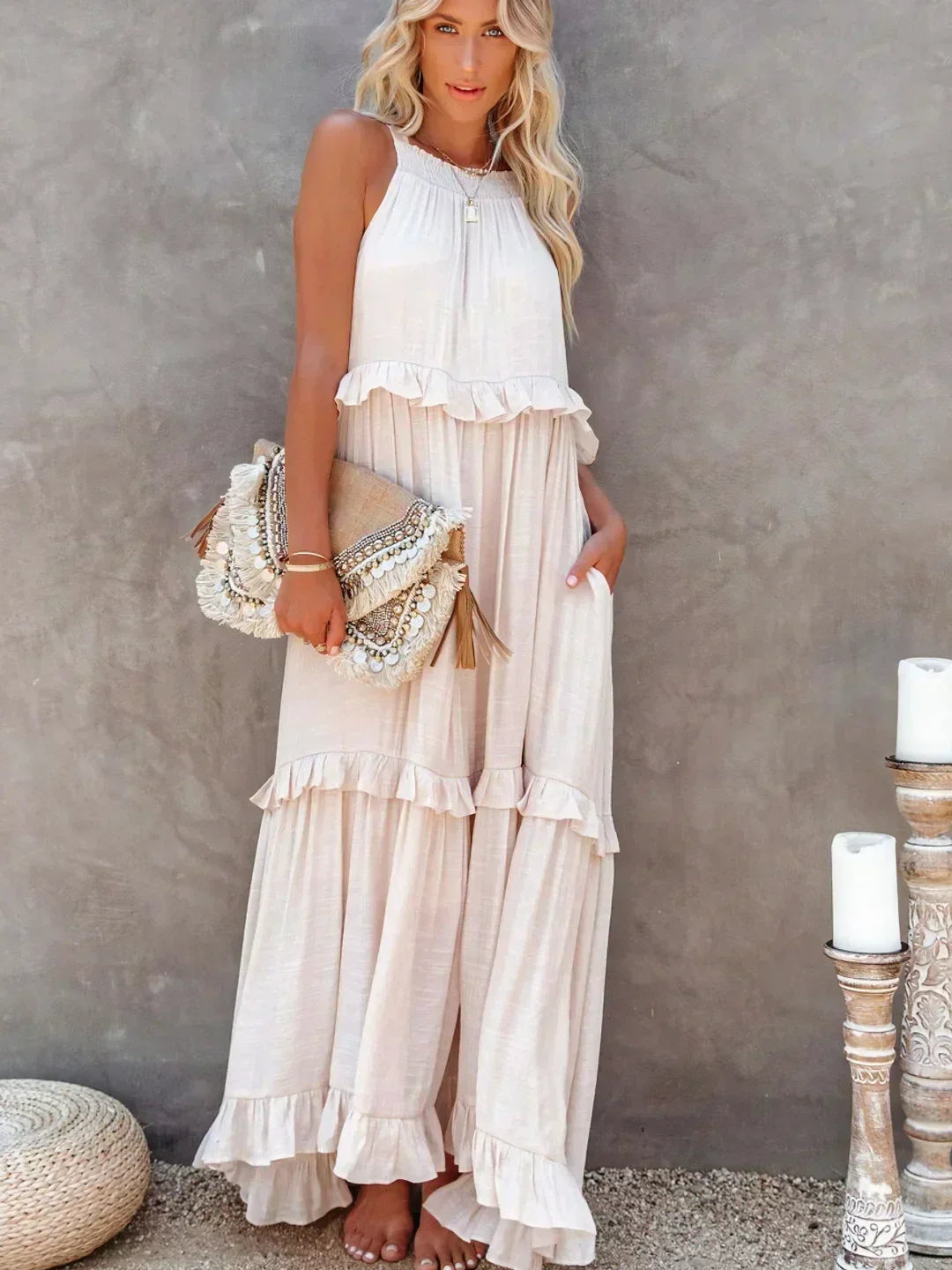 Women's halterneck ruffle maxi dress with pockets, ideal for summer holidays.