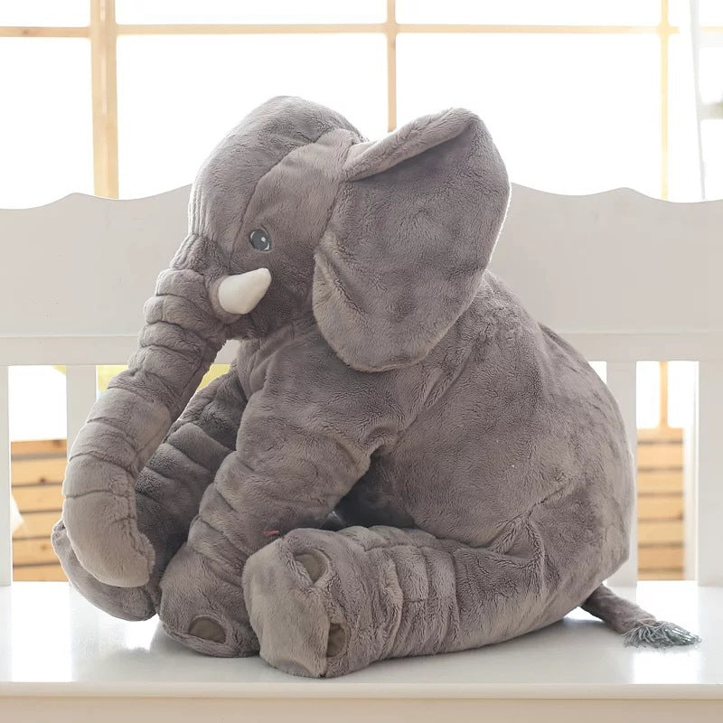 Soft elephant baby pillow, cuddly plush toy for infants, safe & comfortable for sleep.