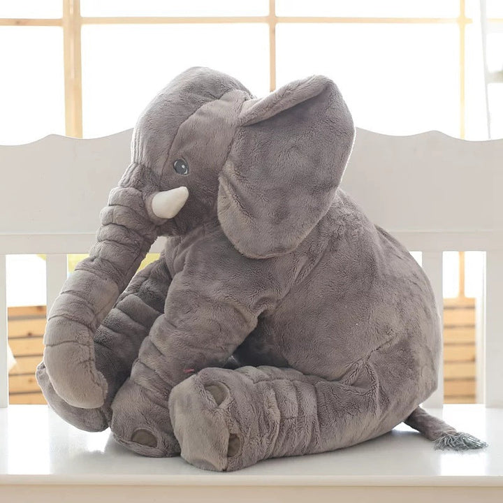 Soft elephant baby pillow, cuddly plush toy for infants, safe & comfortable for sleep.