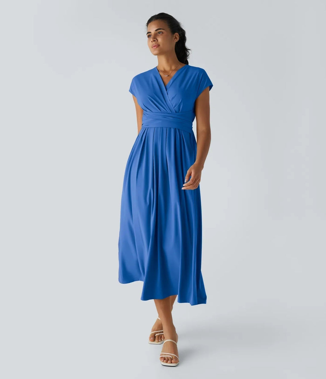 Casual yet elegant women's wrap midi dress. V-neck, short sleeve, high waist for a flattering fit. [[lstfy-media:3]]