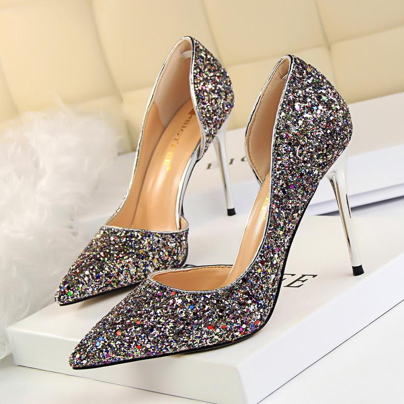 Luxurious women's sparkling stiletto high heels, elegant footwear for fashion-forward evening wear.