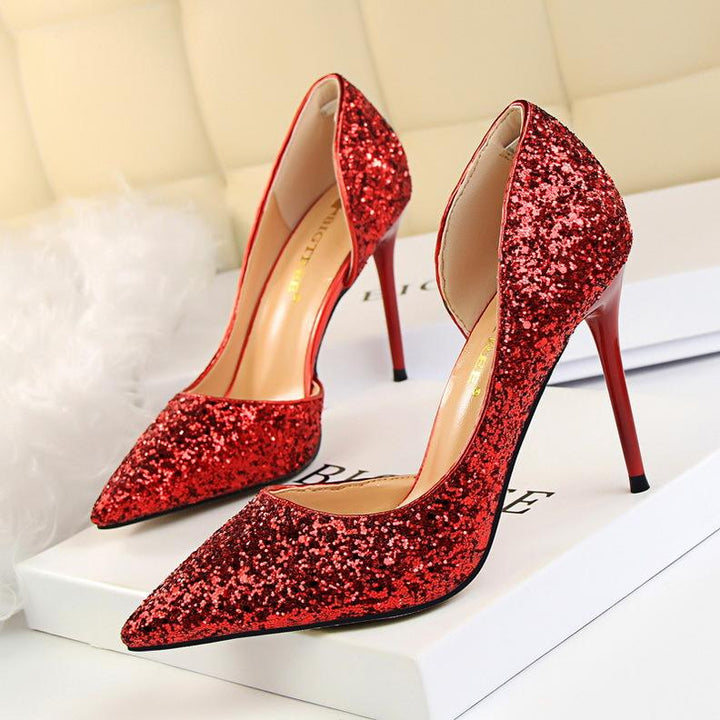 Fashionable women's glitter stiletto high heels, ideal party shoes for a glamorous look.