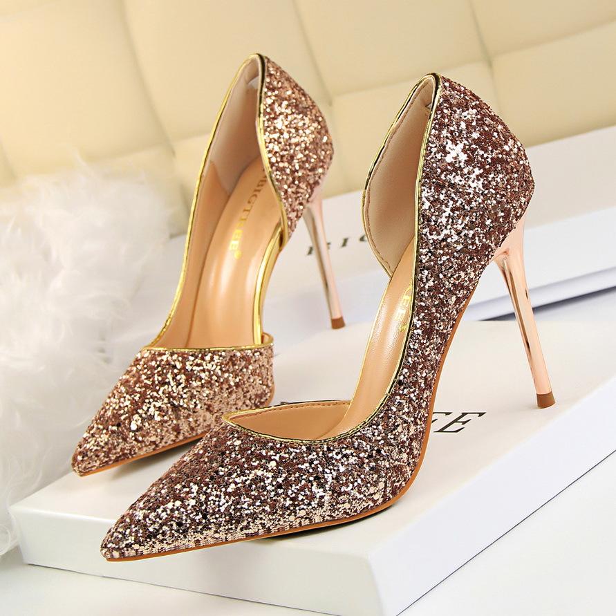 Dazzling women's stiletto heels, glittering party shoes adding glamour to any elegant outfit.