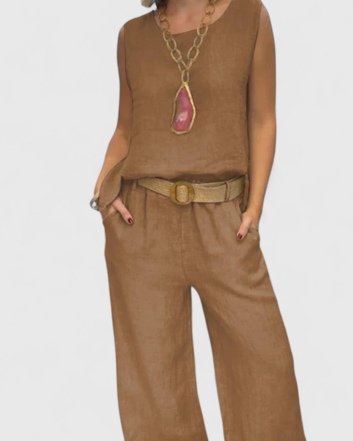 Elegant women's two-piece set in earth tones, featuring a sleeveless top and wide-leg trousers.