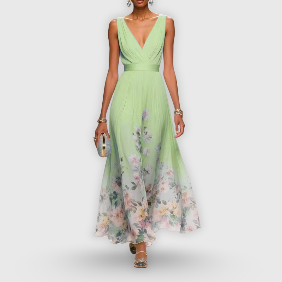 Mint green floral sleeveless dress for women. A comfortable, elegant midi dress perfect for summer days.