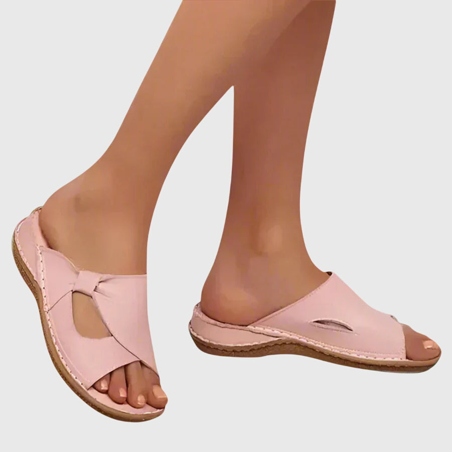Side view of women's comfort sandals, highlighting arch support and pain relief features for daily wear.