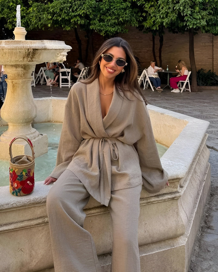 Sophisticated women's two-piece set with a flowing silhouette, including an elegant top & matching trousers.