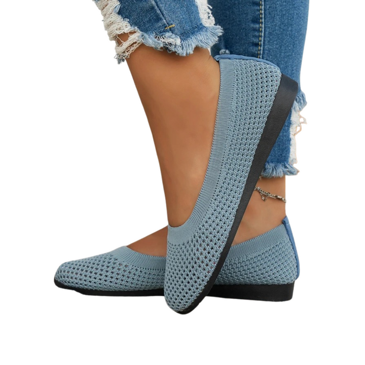 Close-up of women's breathable summer shoe, highlighting its lightweight design & flexible sole.