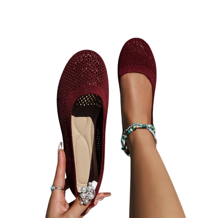 Side view of women's comfortable summer walking shoe, featuring breathable fabric and sleek design.