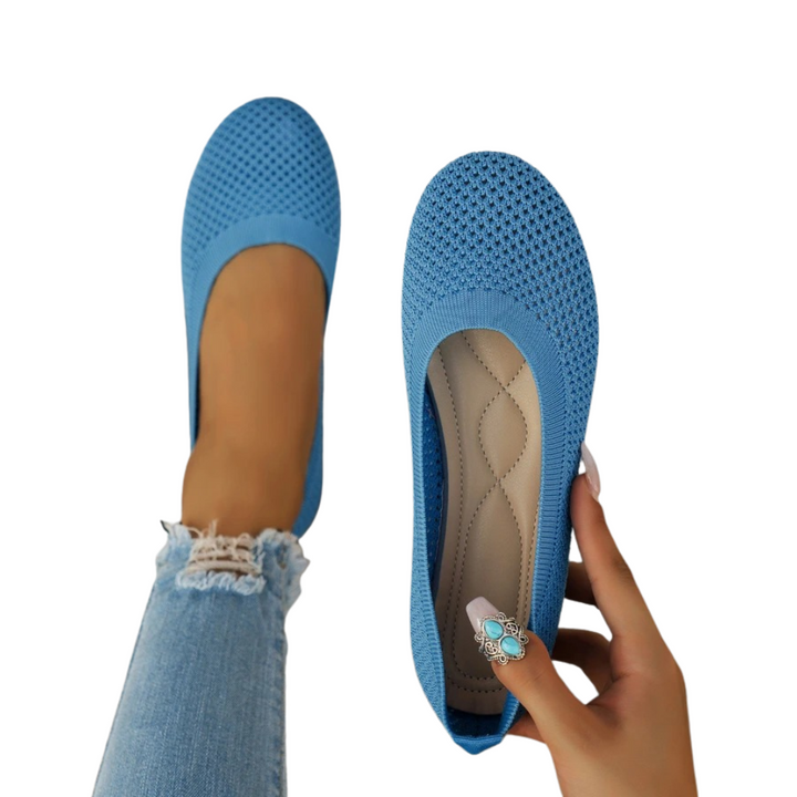 Pair of women's lightweight slip-on summer shoes, offering all-day comfort & effortless style.