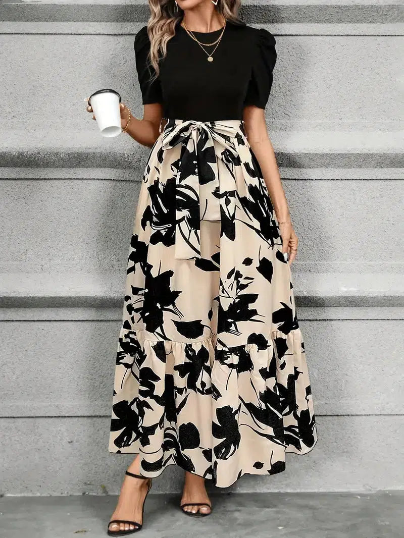 Comfortable women's flowy maxi sundress with a vibrant botanical print, great for casual summer outings.