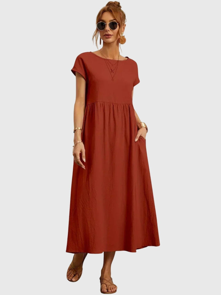 Relaxed fit women's pocket dress, a chic and comfortable choice for spring, summer, and everyday wear.