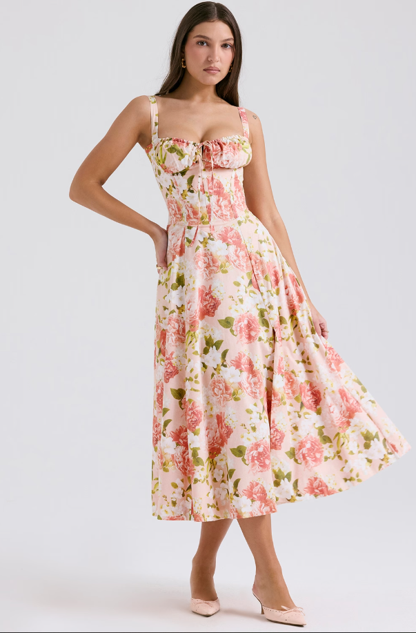 Chic women's white midi dress with floral print and a stylish lace-up corset for evening.