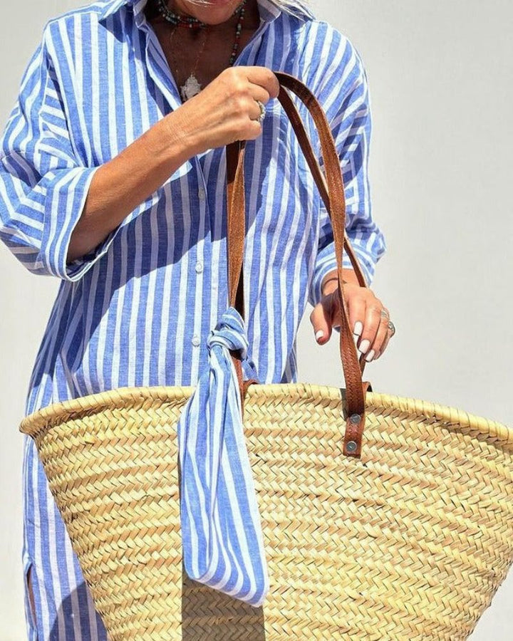Chic women's striped midi shirt dress, a long-sleeve button-down style for an elegant and comfortable look.
