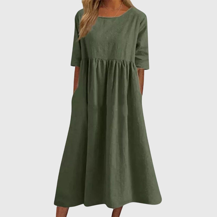 Stylish women's elegant short sleeve midi dress, a classic and versatile piece for various looks.
