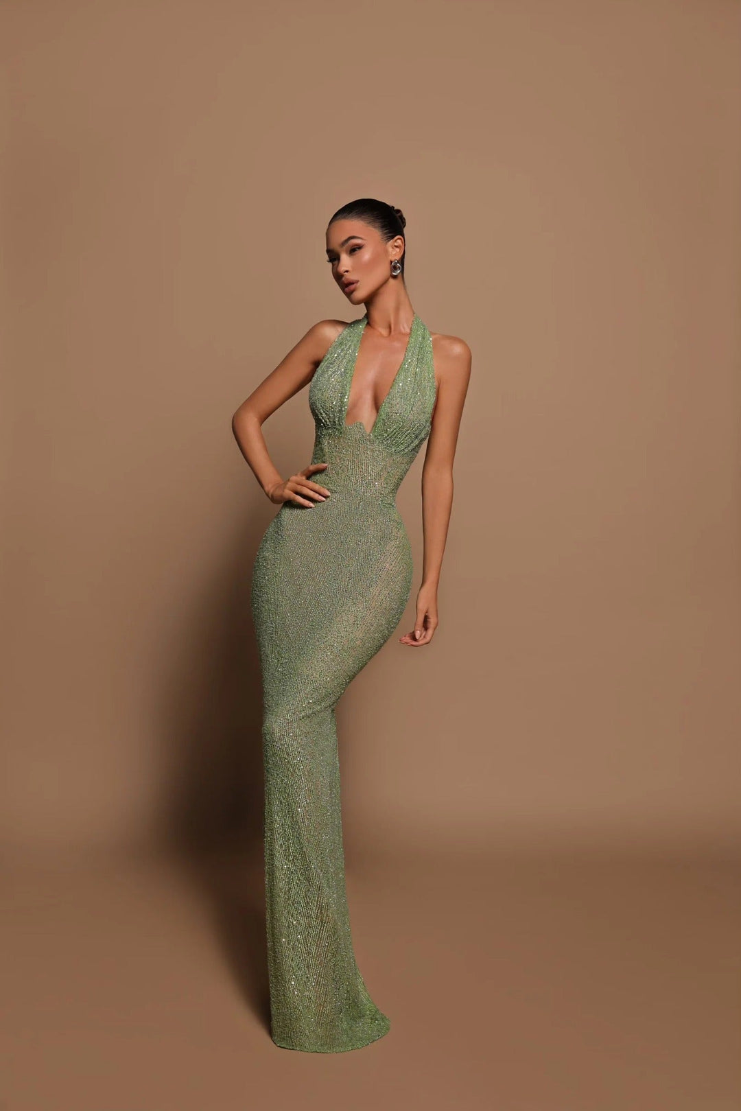 Sparkling sequin maxi dress for women, an elegant long gown ideal for formal events and glamorous parties.