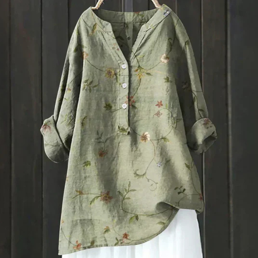 Beautiful printed floral V-neck blouse for women, an elegant long sleeve top perfect for any occasion.