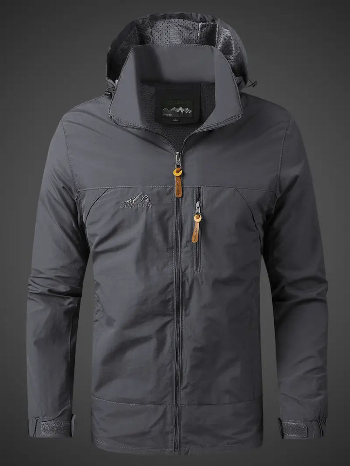 Functional men's hooded waterproof jacket, excellent for rain protection during hiking, camping & general outdoor use.