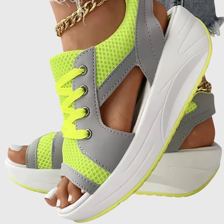 Women's comfy slip-on flat sandals with a stylish open-toe design. Perfect casual summer shoes for women.