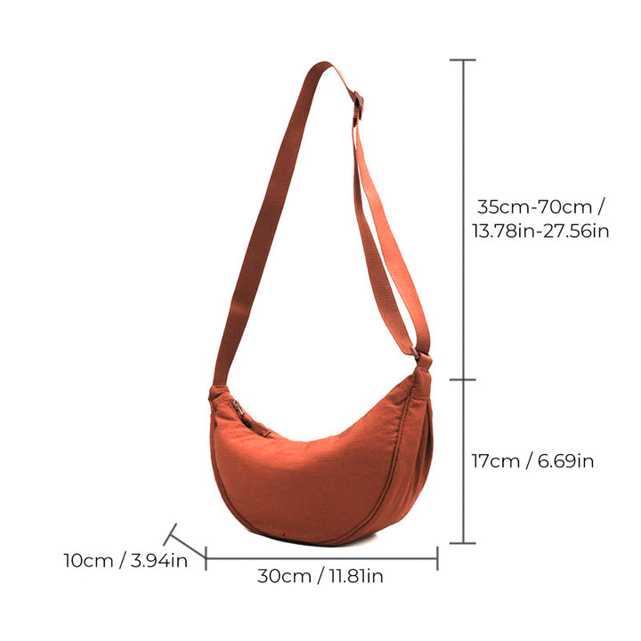 Minimalist Half Moon Crossbody, a chic women's purse versatile enough for any look.