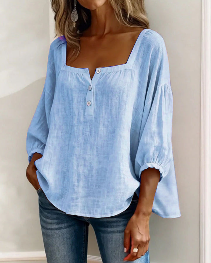 Relaxed fit women's puff sleeve blouse, stylish and perfect for any occasion.