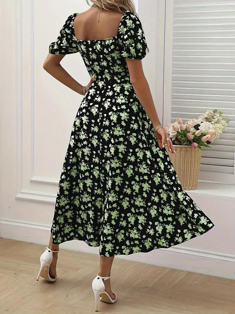 Chic floral A-line midi dress with a stylish split hem & elegant puff sleeves for women.