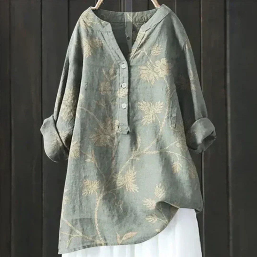 Elegant women's V-neck floral blouse, a versatile long sleeve top with a comfortable loose fit for spring/summer.