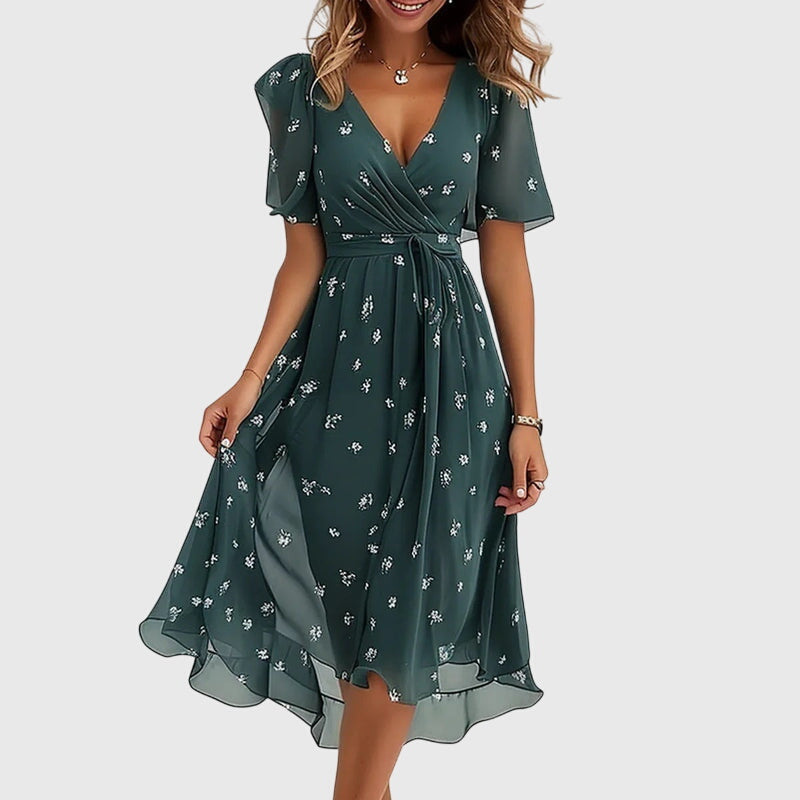 Versatile women's elegant midi dress, a chic flowy design suitable for both casual and formal events.