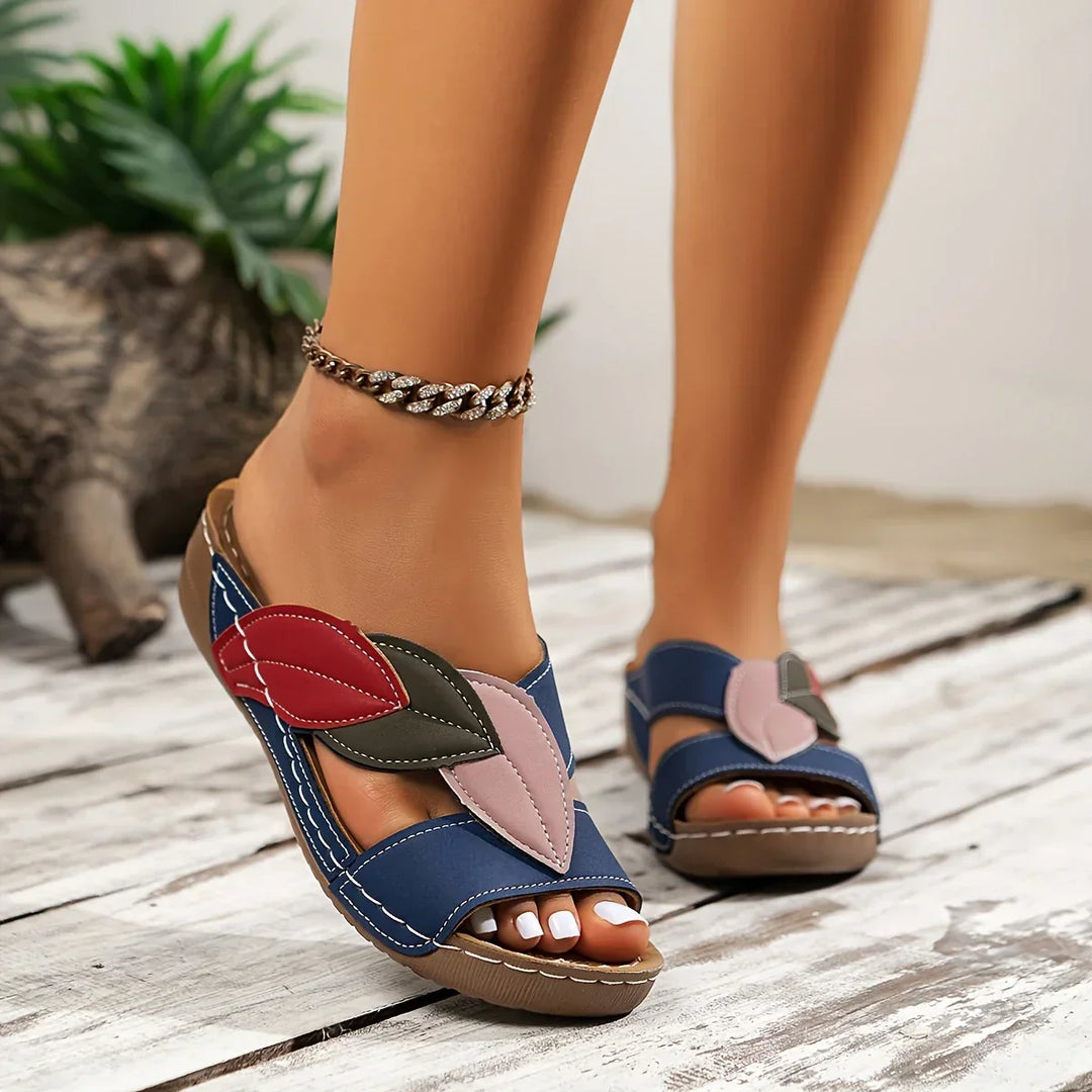 Slip-on comfort sandals for women, offering ergonomic arch support and pain relief for all-day wear.