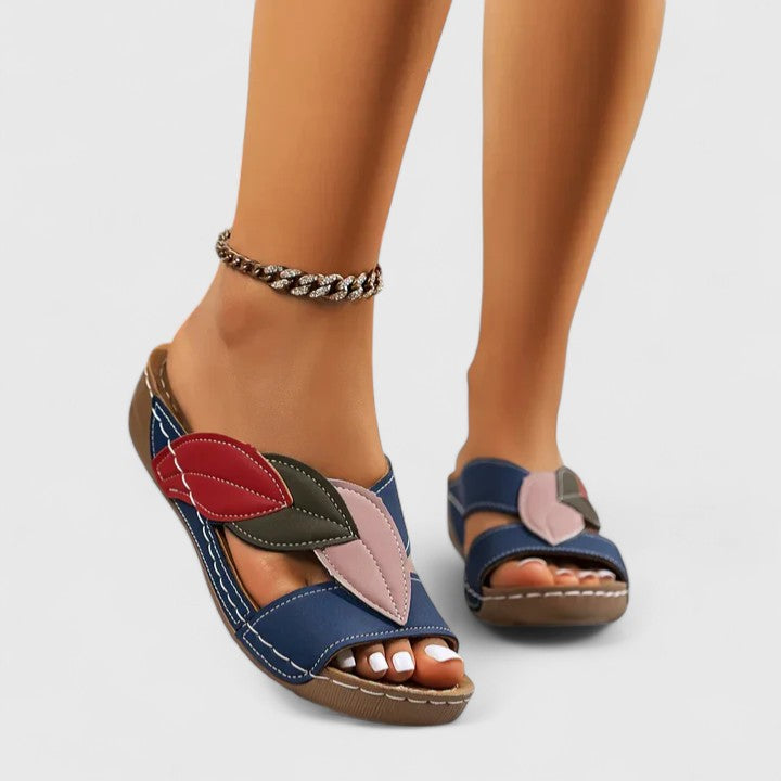 Elegant women's orthopedic sandals in black, providing superb arch support for all-day comfort.