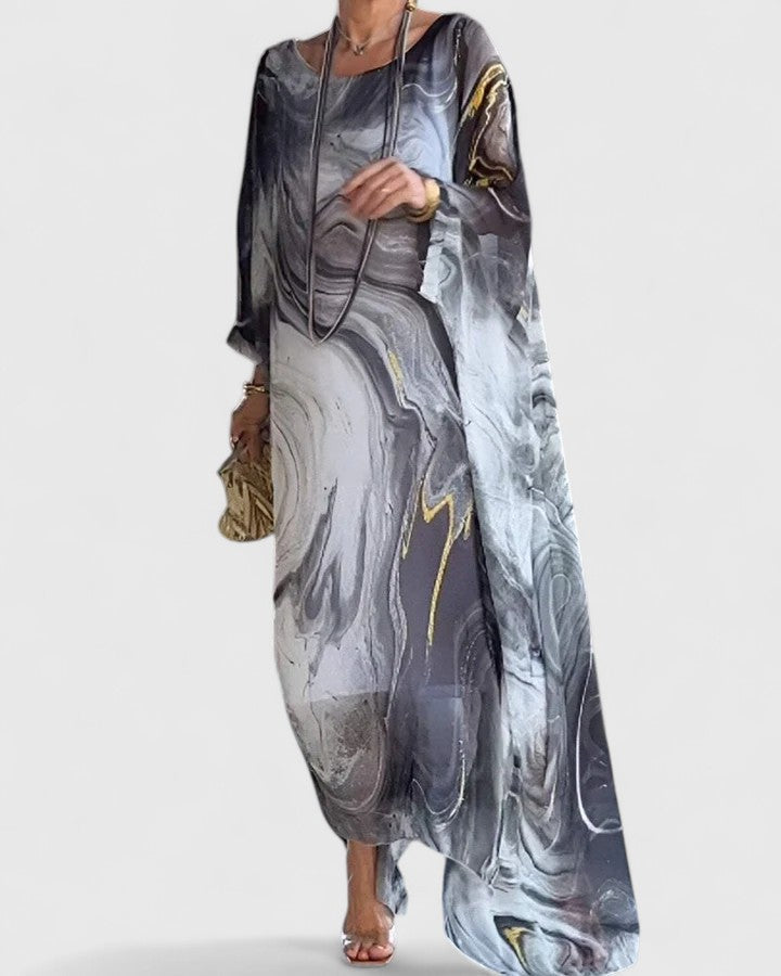 Stylish long women's dress, an elegant flowing maxi perfect for evening wear. Comfortable and flattering formal gown.
