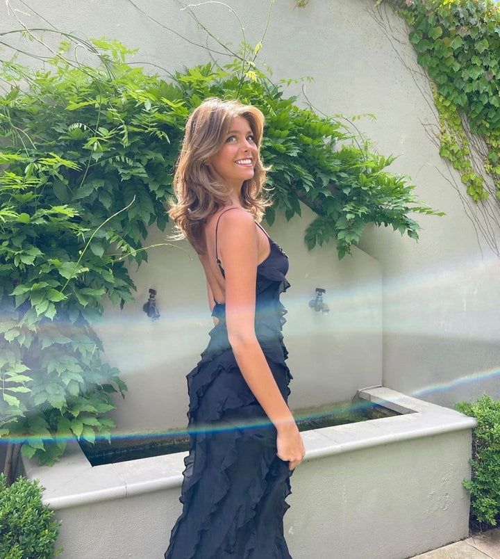 Sophisticated women's ruffled maxi dress, perfect for formal parties and evening wear.