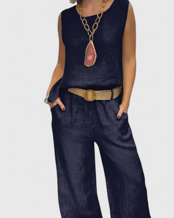 Modern women's two-piece top & pants set with wide-leg trousers and a sleek sleeveless top, casual chic.