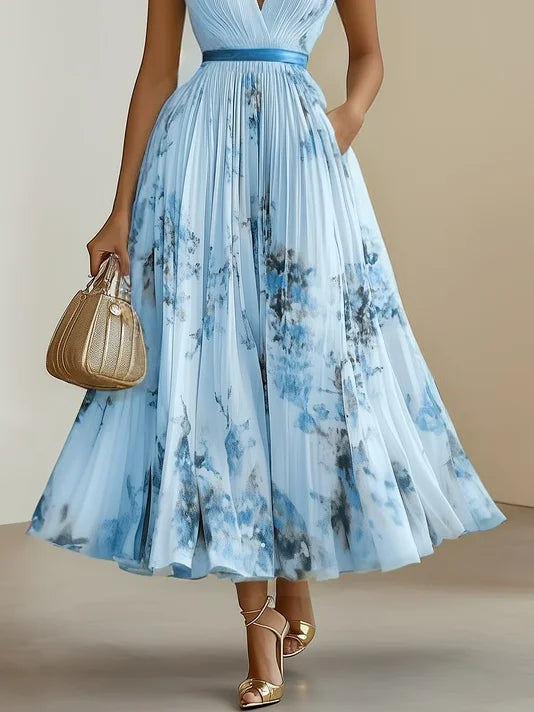 Colorful women's V-neck long dress, sleeveless and flowy, perfect for a casual chic summer look.