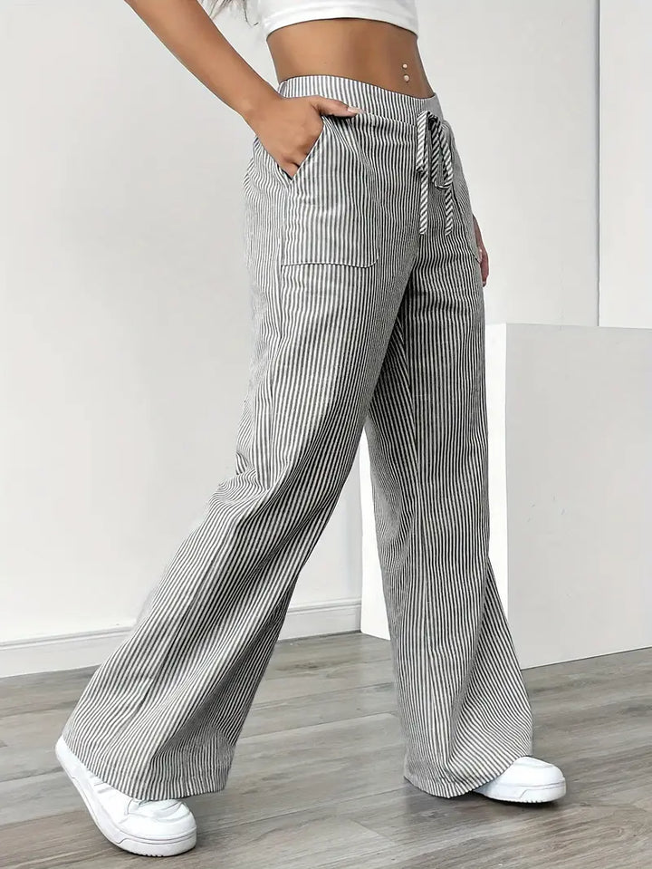 Chic women's wide leg pants, striped, comfortable, with pockets for essentials.