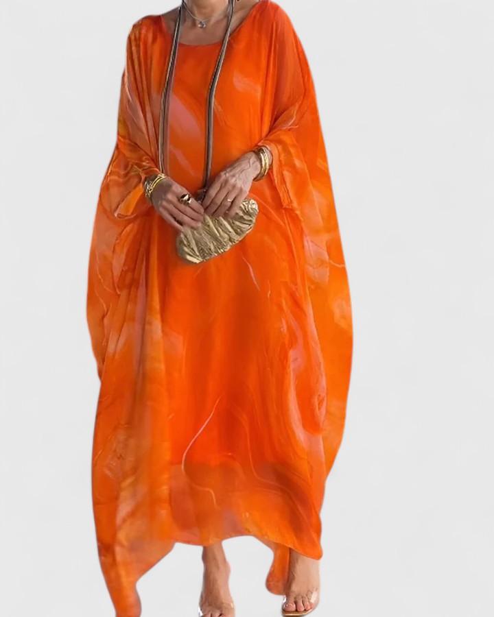 Beautiful women's elegant flowing maxi dress, a comfortable and flattering party or evening gown. Women's fashion.